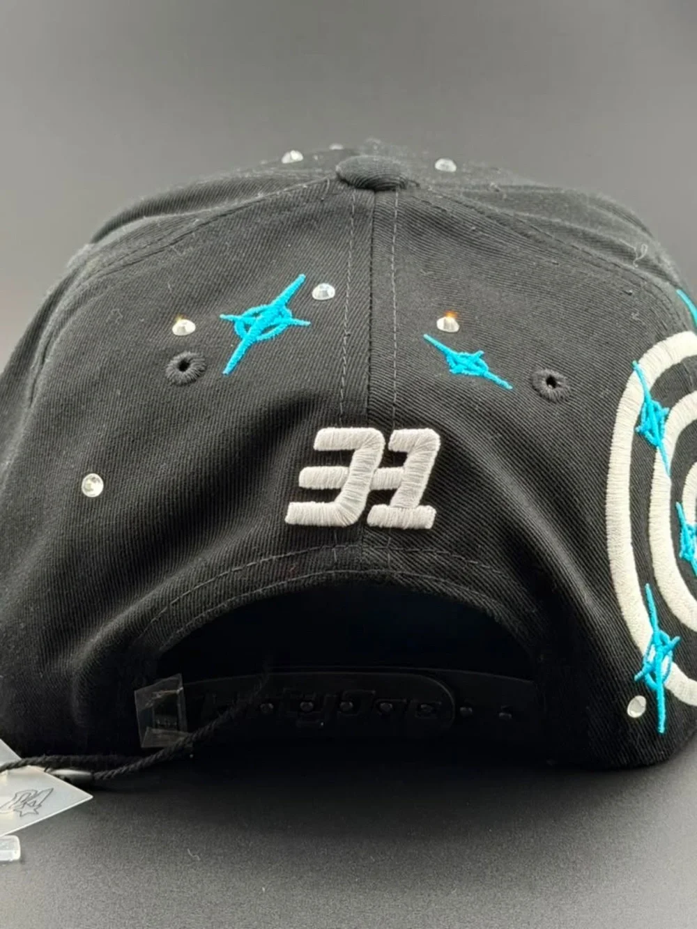 Black Baseball Cap with Blue & White Star Accent